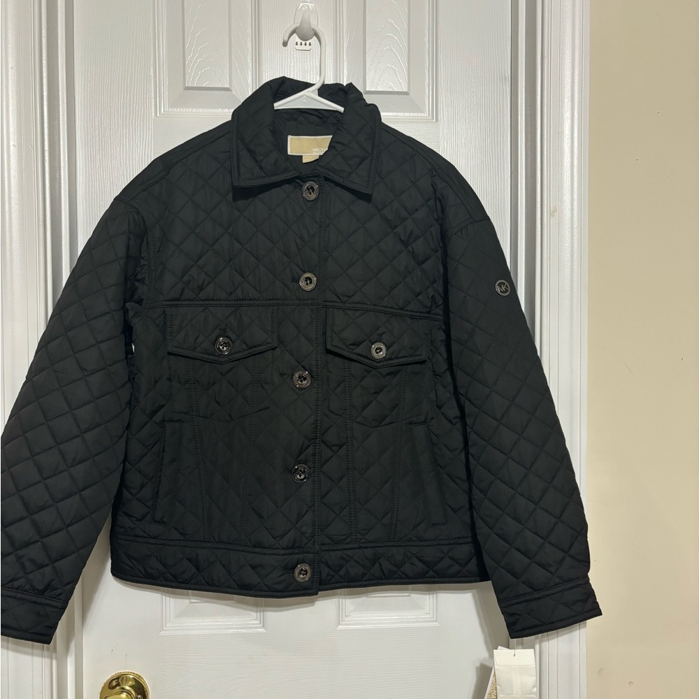 Michael Kors Women’s quilted utility black jacket. Size medium.